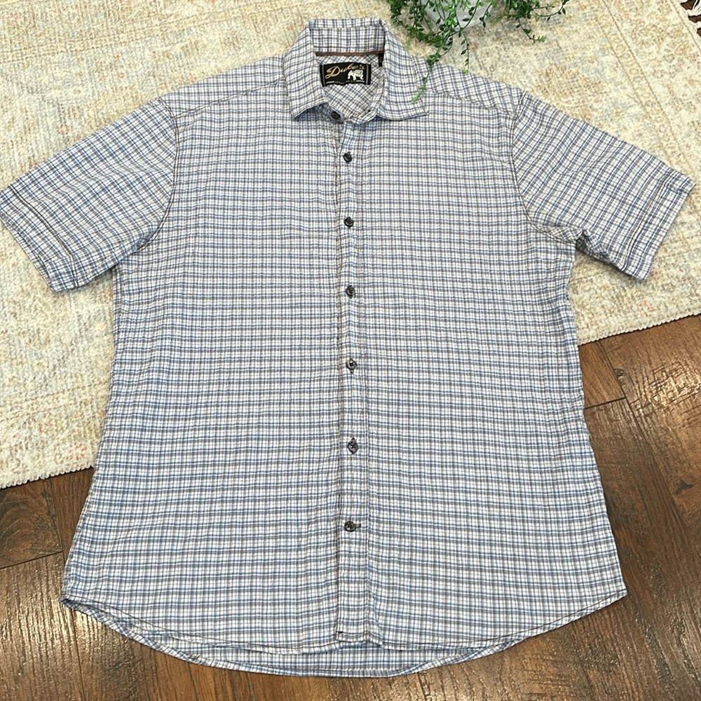Duke’s plaid shirt